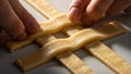 Hands Weaving Lattice Pattern with Dough Strips for Pie Crust Royalty Free Stock Photo