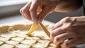 Hands Weaving Lattice Pattern on Pie Crust Dough Royalty Free Stock Photo