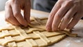 Hands Weaving Lattice Pattern on Pie Dough Royalty Free Stock Photo