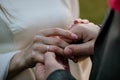 Hands, wedding couple and ring at outdoor ceremony Royalty Free Stock Photo