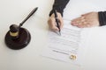 Hands of wife, husband signing decree of divorce, dissolution, canceling marriage, legal separation documents, filing Royalty Free Stock Photo