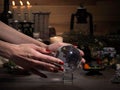Hands witch. Transparent sphere. Magical objects and utensils of the alchemist. Candles, herbs. Concept - alternative medicine,