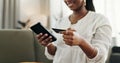 Hands, woman and credit card with smartphone on sofa for online shopping, payment and fintech at home. Closeup, mobile Royalty Free Stock Photo