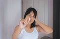 Hand woman holding a medicine pills,Female suffering from abdominal pain and headache