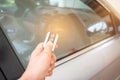 Hands woman holding push remote control car for test system, transportation safety insurrance concept. Remote control is Royalty Free Stock Photo