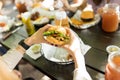 Hands Of Woman Holding Tasty Burger Royalty Free Stock Photo