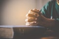 Hands woman laying on the biblical while praying for christian religion blessings and Pray to God Royalty Free Stock Photo