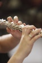 Hands of woman playing the flute Royalty Free Stock Photo