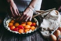 Hands of a woman preparing an apricot pie Royalty Free Stock Photo