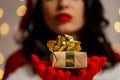 Beautiful sexy girl wearing santa claus clothes with christmas gift Royalty Free Stock Photo