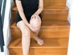 Hand woman touching her legs and having a knee pain,Female feeling exhausted and painful Royalty Free Stock Photo