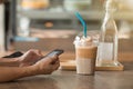 Hands of a woman using a mobile cell phone Royalty Free Stock Photo