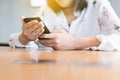 Hands woman using mobile phone,social media,relaxed girl checking cell phone Royalty Free Stock Photo