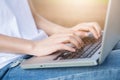 Hands of a woman working with computer,outdoor Royalty Free Stock Photo