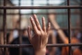 Hands of women desperate to catch the iron prison,prisoner concept,thailand people,Hope to be free,If the violate the law would be Royalty Free Stock Photo