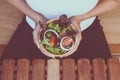 Hands woman holding healthy salad for breakfast in the morning,Clean eating and dieting Royalty Free Stock Photo