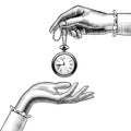 Hands of women with a retro pocket watch