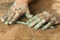 Hands of women working with clay, closeup Royalty Free Stock Photo