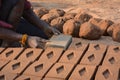 Hands of worker making bricks. Royalty Free Stock Photo