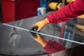 The hands of the worker measure the size of metal with a tape measure Royalty Free Stock Photo