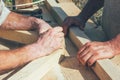 The hands of the workers carpenters