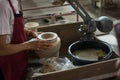 Hands working clay on potter`s wheel in Thailand Royalty Free Stock Photo