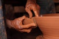 Hands working on crockery Royalty Free Stock Photo