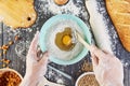 Hands working with dough preparation recipe bread, pizza or pie making ingridients, food flat lay on kitchen table background Royalty Free Stock Photo