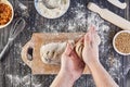 Hands working with dough preparation recipe bread, pizza or pie making ingridients, food flat lay on kitchen table background Royalty Free Stock Photo