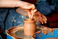 Hands working on pottery wheel Royalty Free Stock Photo