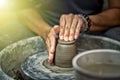 Hands working on pottery wheel Royalty Free Stock Photo