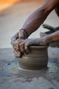 Potter hands pot. Royalty Free Stock Photo