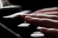 Hands writing on old typewriter over wooden table Royalty Free Stock Photo