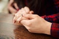 Hands of a young couple with a ring. close up of man giving diamond ring to woman Royalty Free Stock Photo