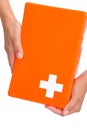 Hands of young woman holding first aid kit Royalty Free Stock Photo