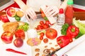 Hands of a young woman preparing school lunch box. Royalty Free Stock Photo