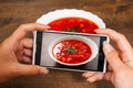 A hands young woman taking photo of food on smartphone Royalty Free Stock Photo