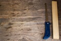 Handsaw over a wooden boards background Royalty Free Stock Photo