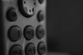 Handset with buttons and joystick, close-up bw photo