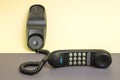 Handset and fixed telephone with tone dialing.