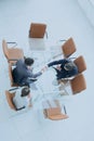 Handshake across the table. Meeting around a boardroom table. Royalty Free Stock Photo