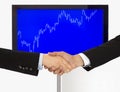 Handshake agreement investment in economic Royalty Free Stock Photo