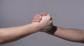 Handshake, arms friendship. Helping support hand. Support hands. Concept of support. Strong hold. Handshake. Rescue Royalty Free Stock Photo