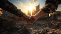 Handshake and blur background of silhouette against sunlight pass through wreck and ruin of existing city after warfare.