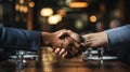 Close-up of the hands of two businesspeople in suits shaking hands. AI Generated.