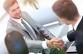 Handshake business partners in the lobby of the office. Royalty Free Stock Photo