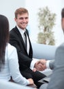 Handshake business partners in the lobby of the office. Royalty Free Stock Photo