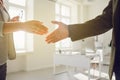 Handshake of businessmen. Female and male hand makes a handshake in the office. Royalty Free Stock Photo