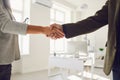 Handshake of businessmen. Female and male hand makes a handshake in the office. Royalty Free Stock Photo