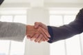 Handshake of businessmen. Female and male hand makes a handshake in the office. Royalty Free Stock Photo